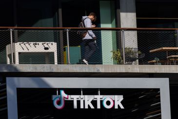 A person arrives at the offices of Tik Tok after the U.S. House of Representatives overwhelmingly passed a bill that would give TikTok's Chinese owner ByteDance about six months to divest the U.S. assets of the short-video app or face a ban, in Culver City, California, U.S., March 13, 2024.  REUTERS/Mike Blake