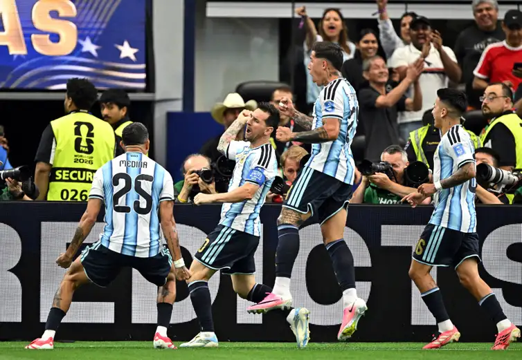 Soccer Football - FIFA World Cup 2026 - Group J - Argentina v Austria - Dallas Stadium, Arlington, Texas, U.S. - June 22, 2026
Argentina's Lionel Messi celebrates scoring their first goal with Enzo Fernandez, Facundo Medina and Thiago Almada IMAGN IMAGES via Reuters/Maria Lysaker     TPX IMAGES OF THE DAY