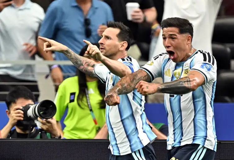 Soccer Football - FIFA World Cup 2026 - Group J - Argentina v Austria - Dallas Stadium, Arlington, Texas, U.S. - June 22, 2026 Argentina's Lionel Messi celebrates scoring their first goal with Enzo Fernandez IMAGN IMAGES via Reuters/Maria Lysaker